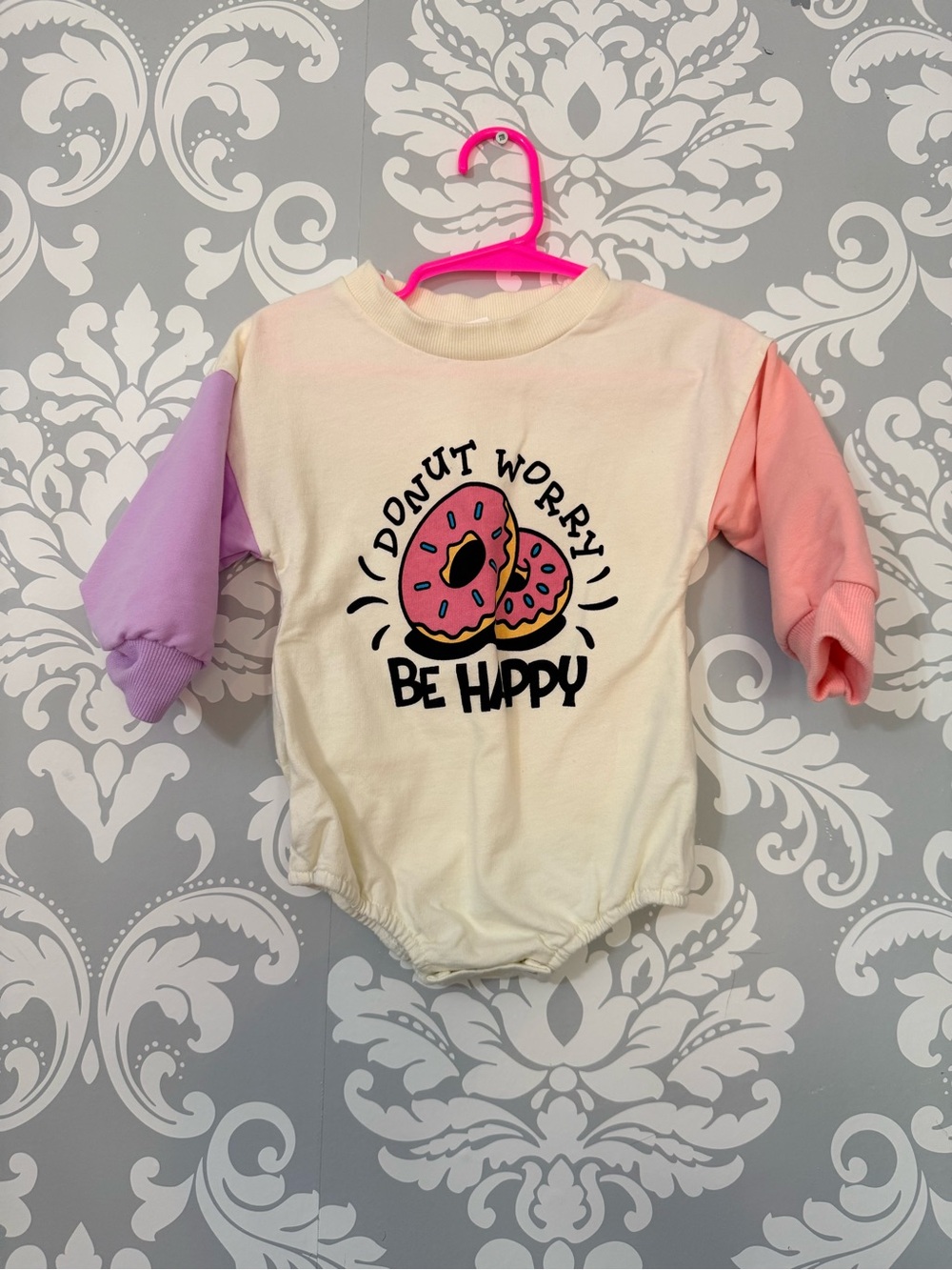 💫10/$25 • Girls Cream Donut Worry Graphic Long-Sleeve Bodysuit